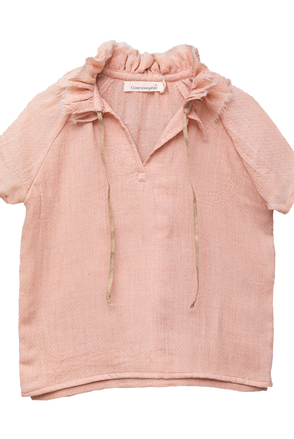 Blusa de mujer rosa con efecto jacquard, cuello de volantes deshilachados y cordones dorados. Diseño femenino y especial.