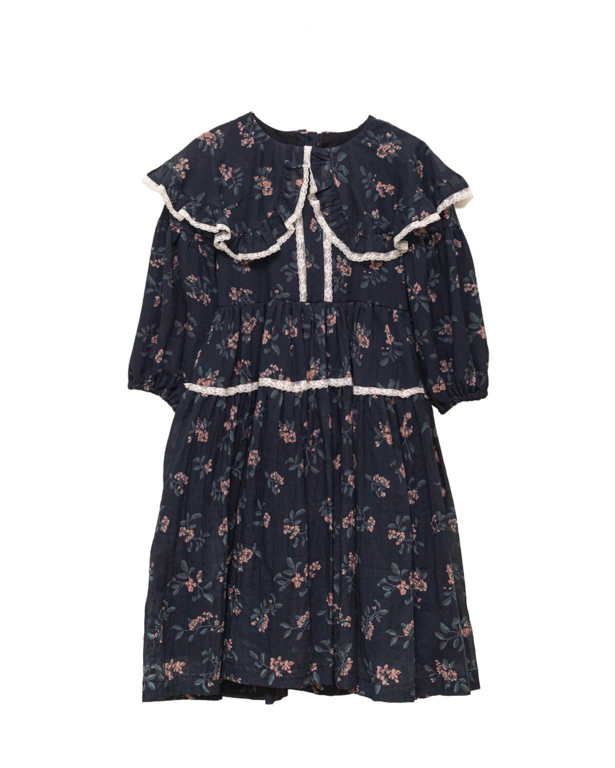 Vestido infantil romántico de voile de algodón azul noche con estampado floral y detalles de encaje Valencienne. Un diseño especial y atemporal.