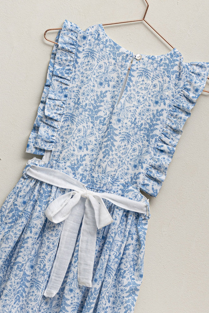 Vestido pichi con volantes en el pecho y estampado de flores en tonos azules. Cosmosophie