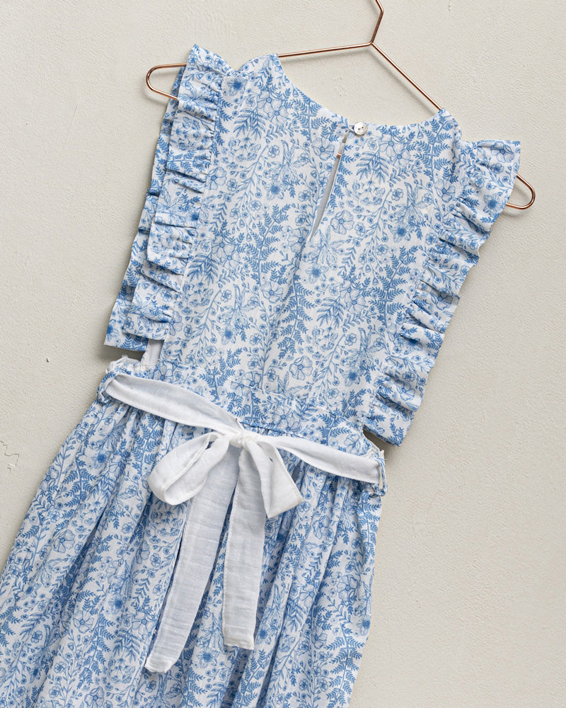 Vestido pichi con volantes en el pecho y estampado de flores en tonos azules. Cosmosophie