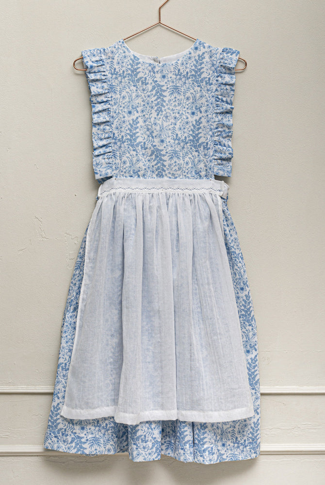 Vestido pichi con volantes en el pecho y estampado de flores en tonos azules. Cosmosophie