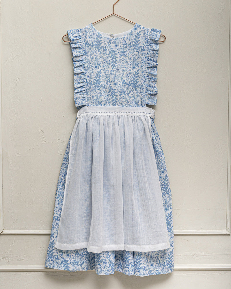 Vestido pichi con volantes en el pecho y estampado de flores en tonos azules. Cosmosophie