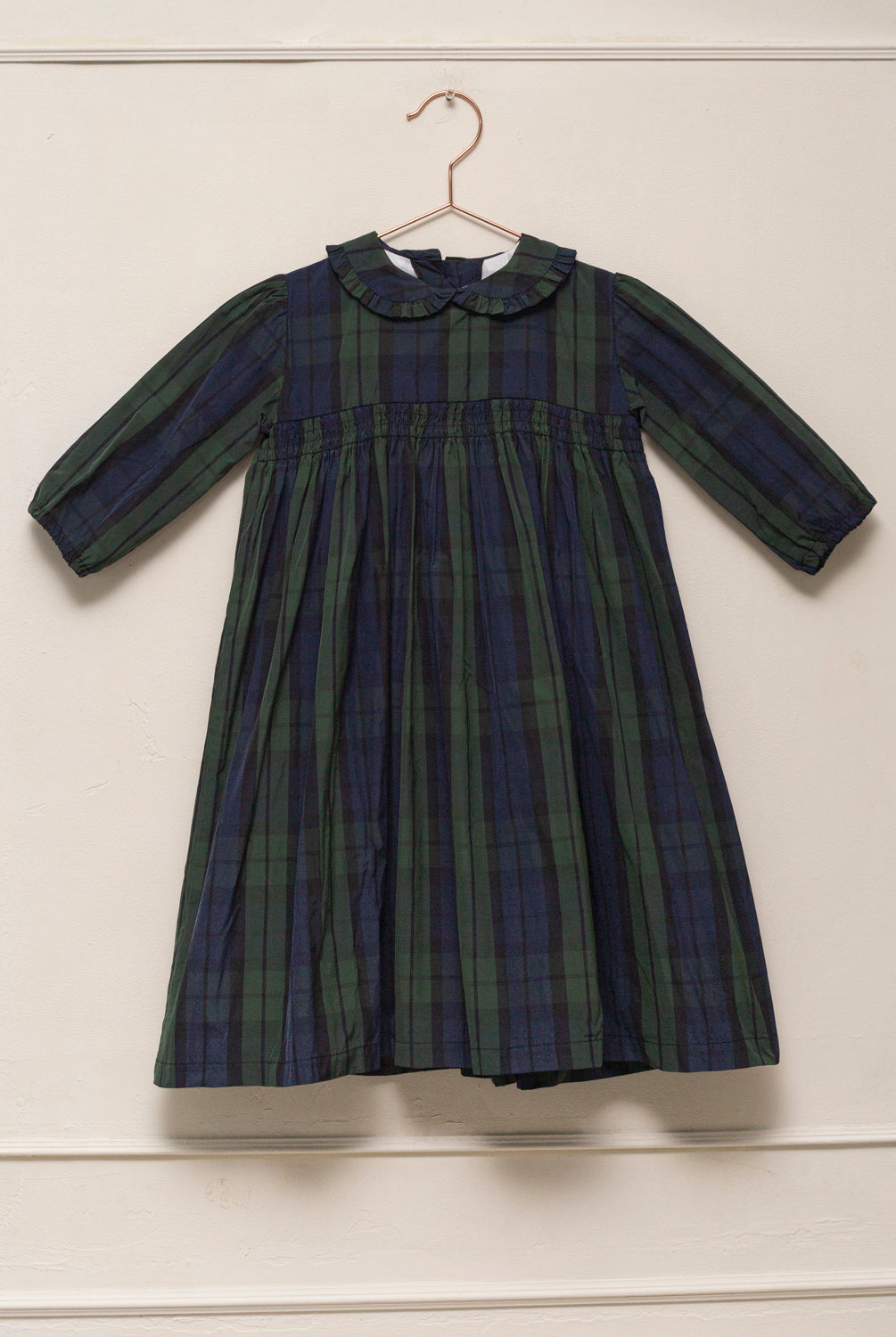 Vestido elegante de niña Paola en tafetán de cuadros verde y azul marino. Un diseño clásico y sofisticado, perfecto para ocasiones especiales.