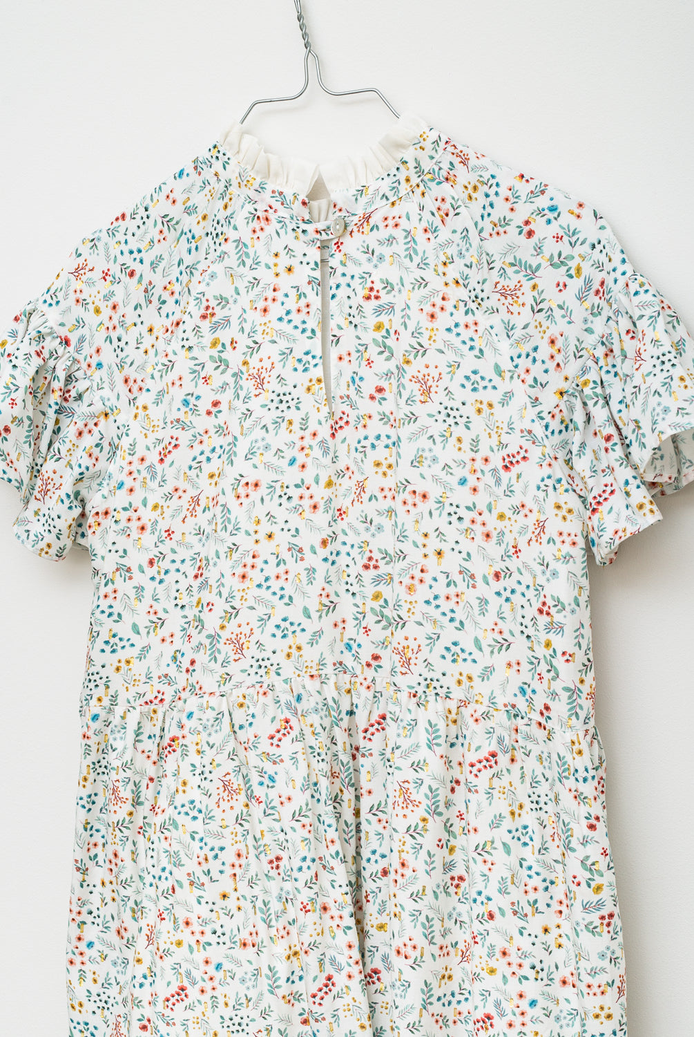 Vestido flores con oro de Cosmosophie