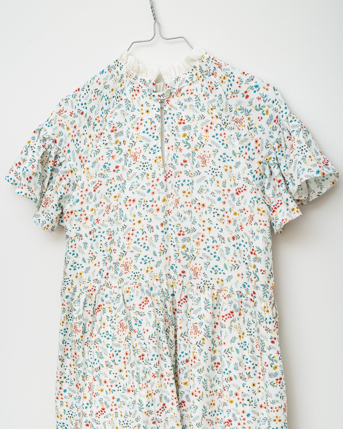 Vestido flores con oro de Cosmosophie