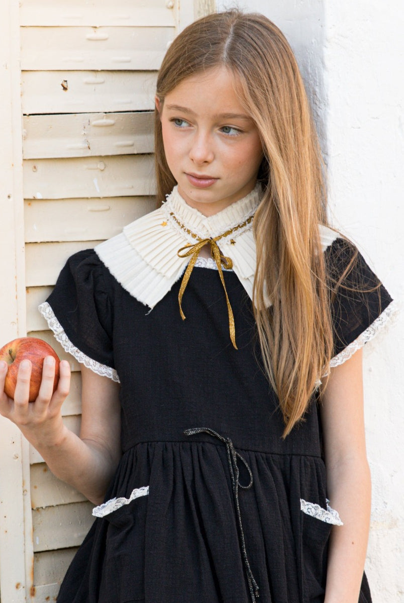 pleated collar with gold bow and stars detail