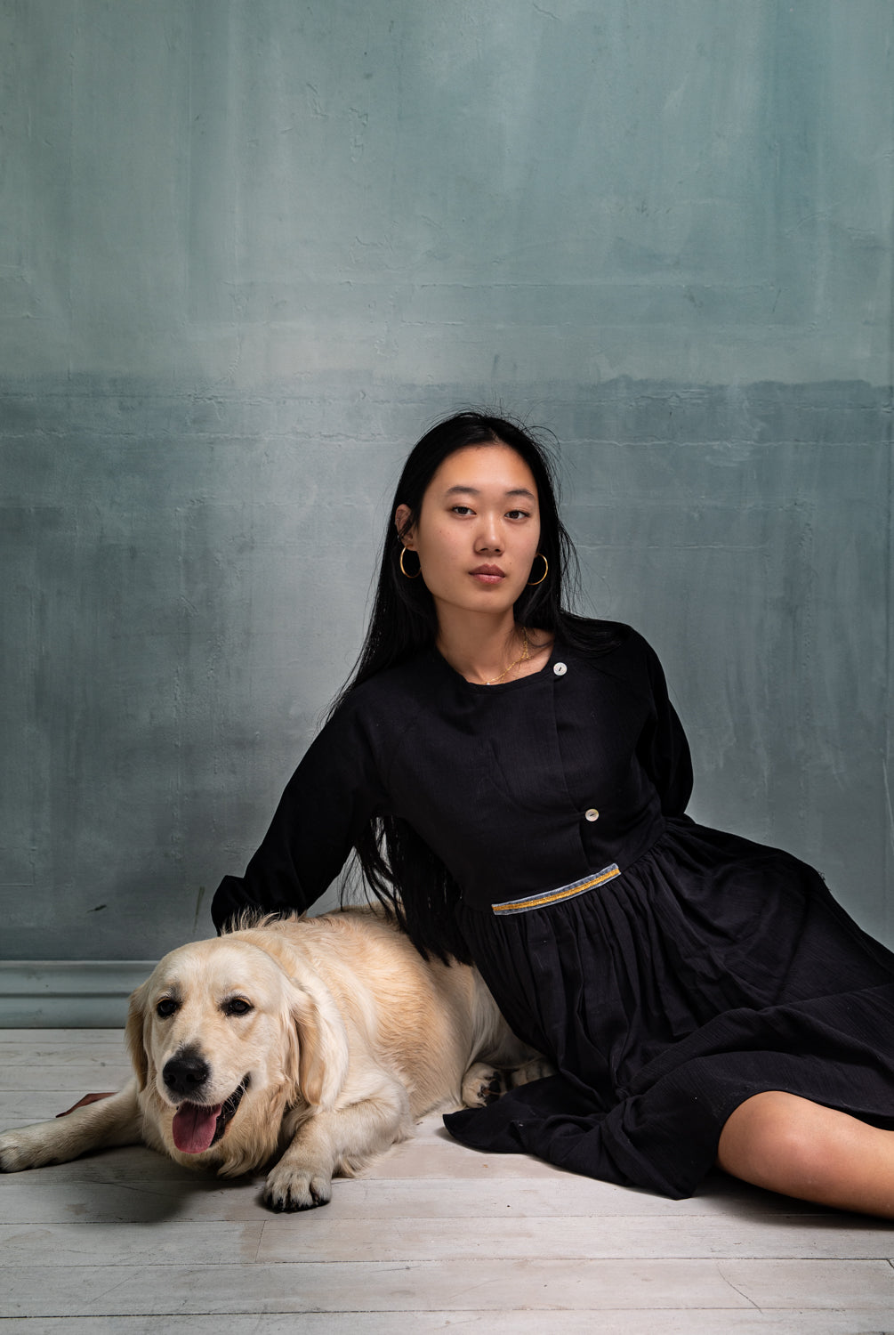 Teenager dress in black. Long sleeve. Crossed chest. Velvet and gold detail. European brand dresses