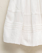 Conjunto falda y blusa en blanco con encaje guipur para niña cosmosophie