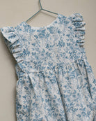 Ranita para bebe en una preciosa batista bordada con estampado de flores.