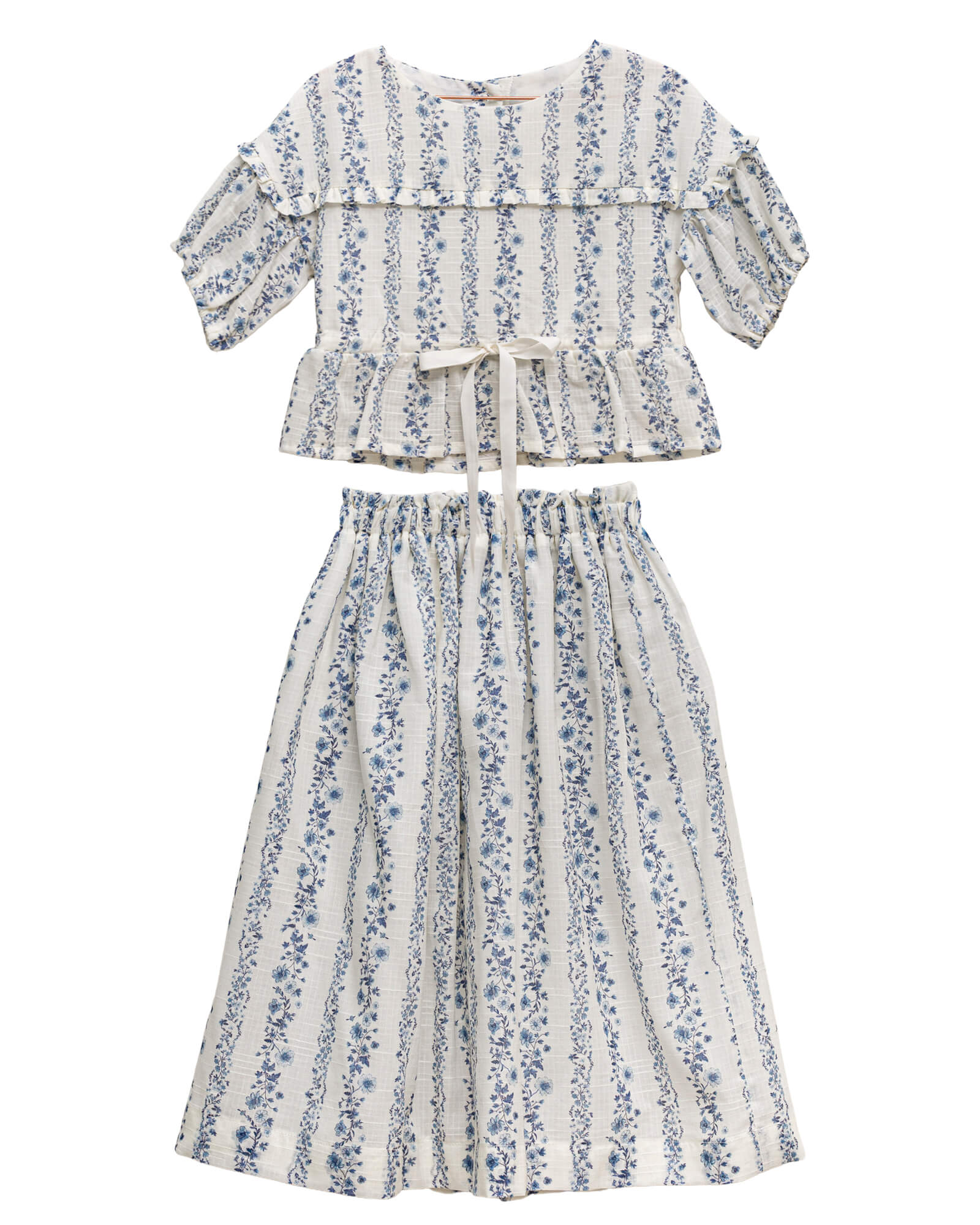 Conjunto para niña teen adolescente de blusa y falda, invitada a boda o primera comunion de flores azules Cosmosophie.