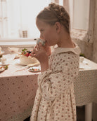 Vestido niña cerezas Mona de Cosmosophie