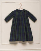 Vestido elegante de niña Paola en tafetán de cuadros verde y azul marino. Un diseño clásico y sofisticado, perfecto para ocasiones especiales.