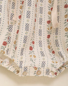 Ranita elegante de algodón para bebé con estampado floral vintage, mangas abullonadas y lazos en la cintura. Diseño de Cosmosophie para ocasiones especiales.