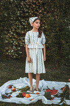 Conjunto para niña teen adolescente de blusa y falda, invitada a boda o primera comunion de flores azules Cosmosophie.