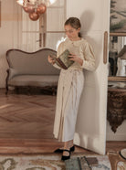 Falda beige plisada para adolescente