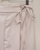 Falda beige plisada para adolescente