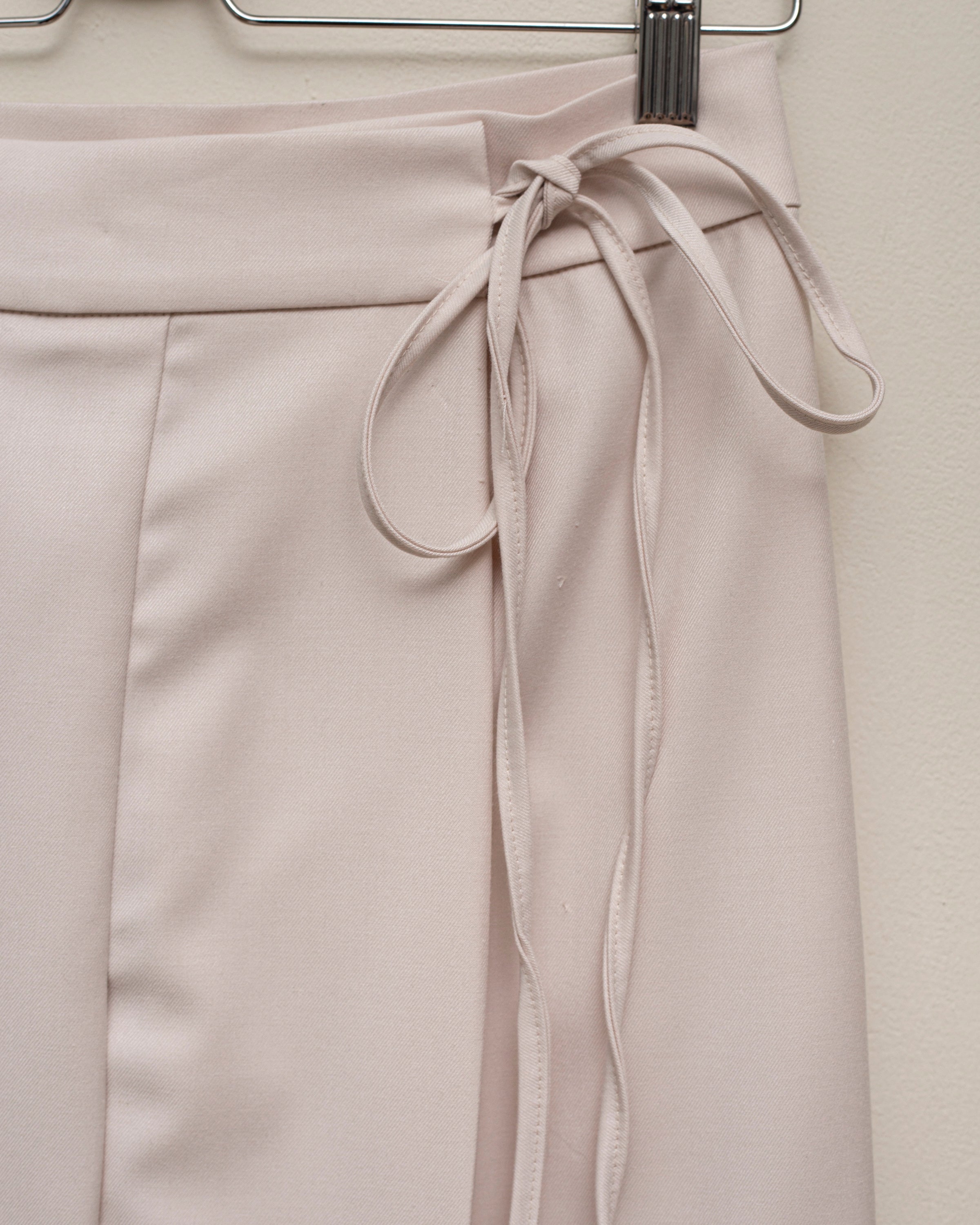 Falda beige plisada para adolescente