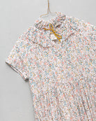 Vestido de invitada para niña en viscosa de flores y puntos dorados. para bautizo boda o comunión Cosmosophie