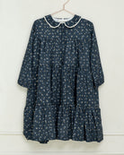 Vestido azul noche con flores y oro Cosmosophie