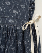 Pichi Hermes de lino azul marino con estampado de arboles de Cosmosophie.