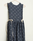 Pichi Hermes de lino azul marino con estampado de arboles de Cosmosophie.