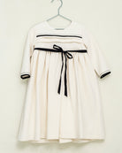 Vestido crcudo con detalles y lazo en negro Palais Cosmosophie.