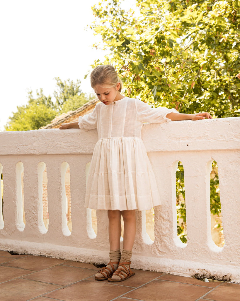 specially designed for special occasions, a flower girl dress or a wedding guest. Cosmosophie luxury kidswear brand