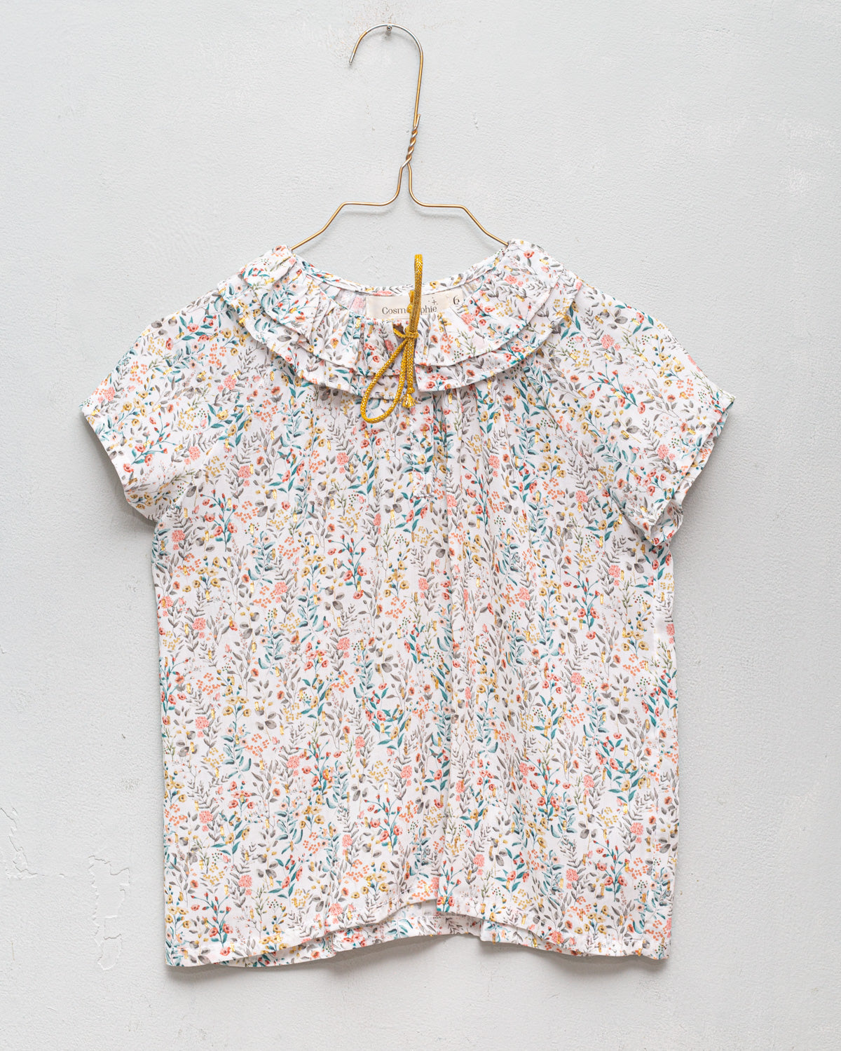 baby shirt ruffled collar in flower print with gold dots