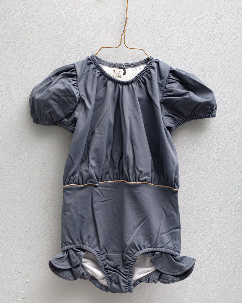 Short sleeve swuimsuit for girl in grey . gold detail. Cosmosophie swimwear